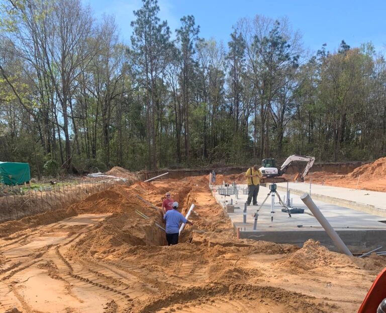 All clear plumbing employees at a work site