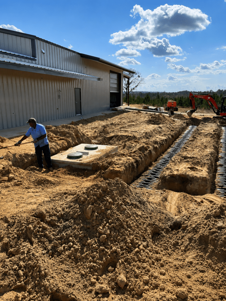 Commercial septic drain field installation by All Clear Plumbing in Mobile, Alabama.